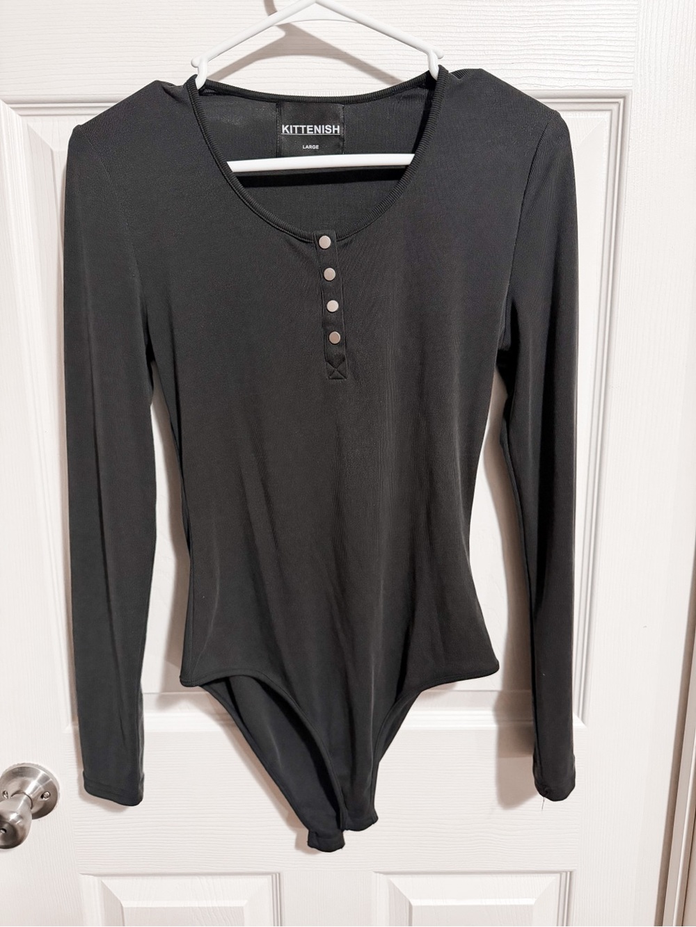 Kittenish Black Long-Sleeve Snap-Front Ribbed Bodysuit